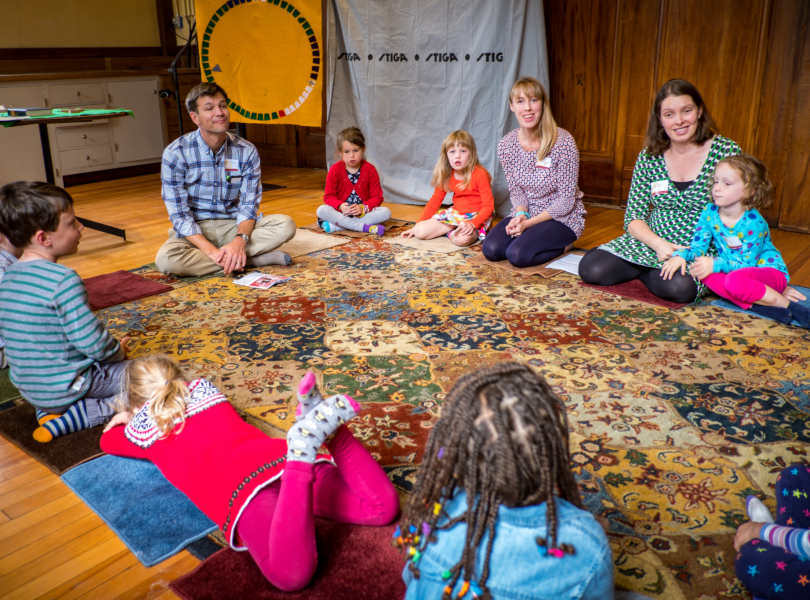 kids sitting in a circle on the floor