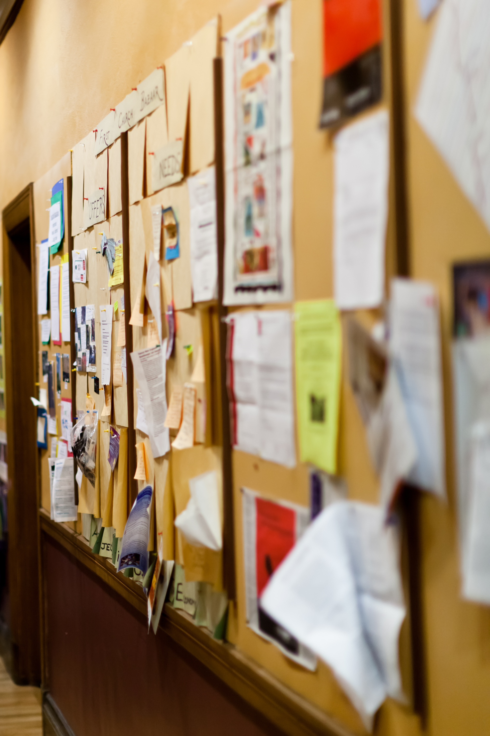 fliers on a bulletin board